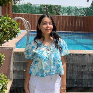 LILY PEPLUM TOP IN AQUA BLUE